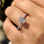 Oval Diamond Engagement Ring With Hidden Halo Setting