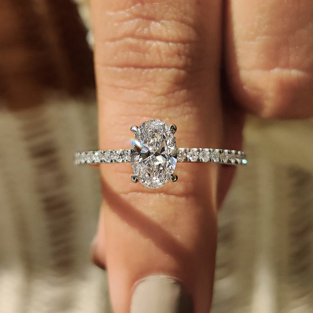 Oval Diamond Engagement Ring With Hidden Halo Setting