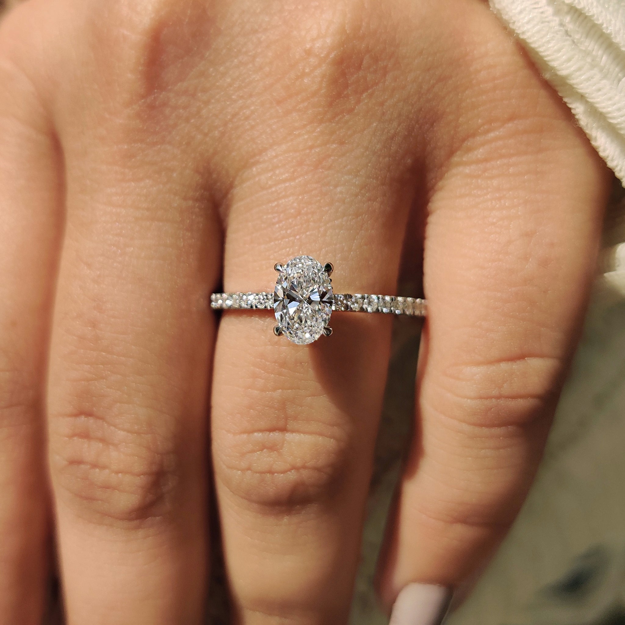 Oval Diamond Engagement Ring With Hidden Halo Setting