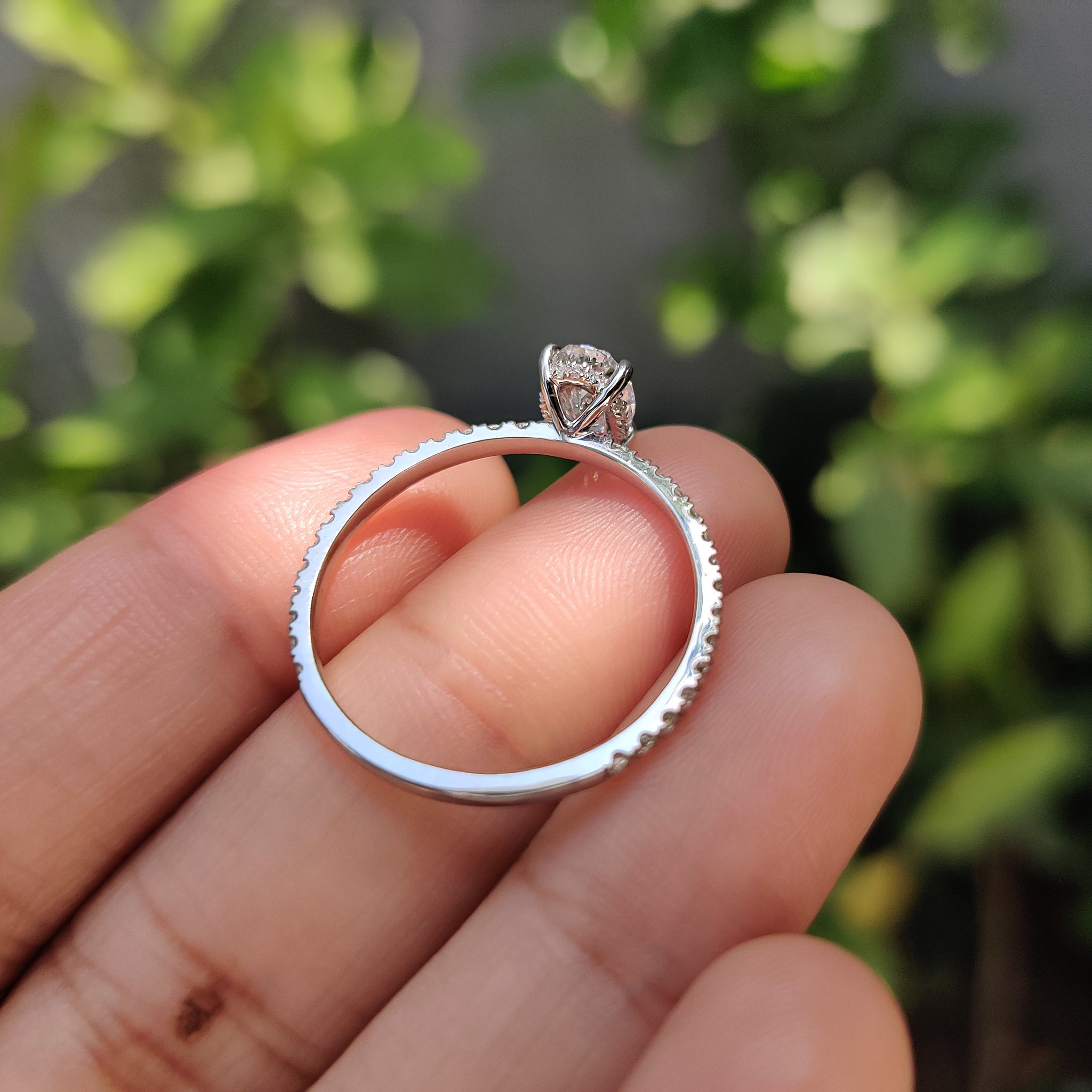 Oval Diamond Engagement Ring With Hidden Halo Setting