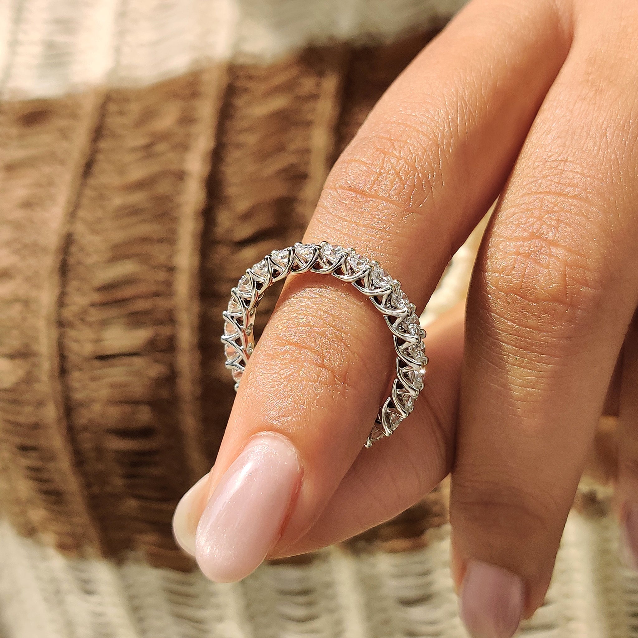 Round Cut Full Eternity Band With Trellis Setting