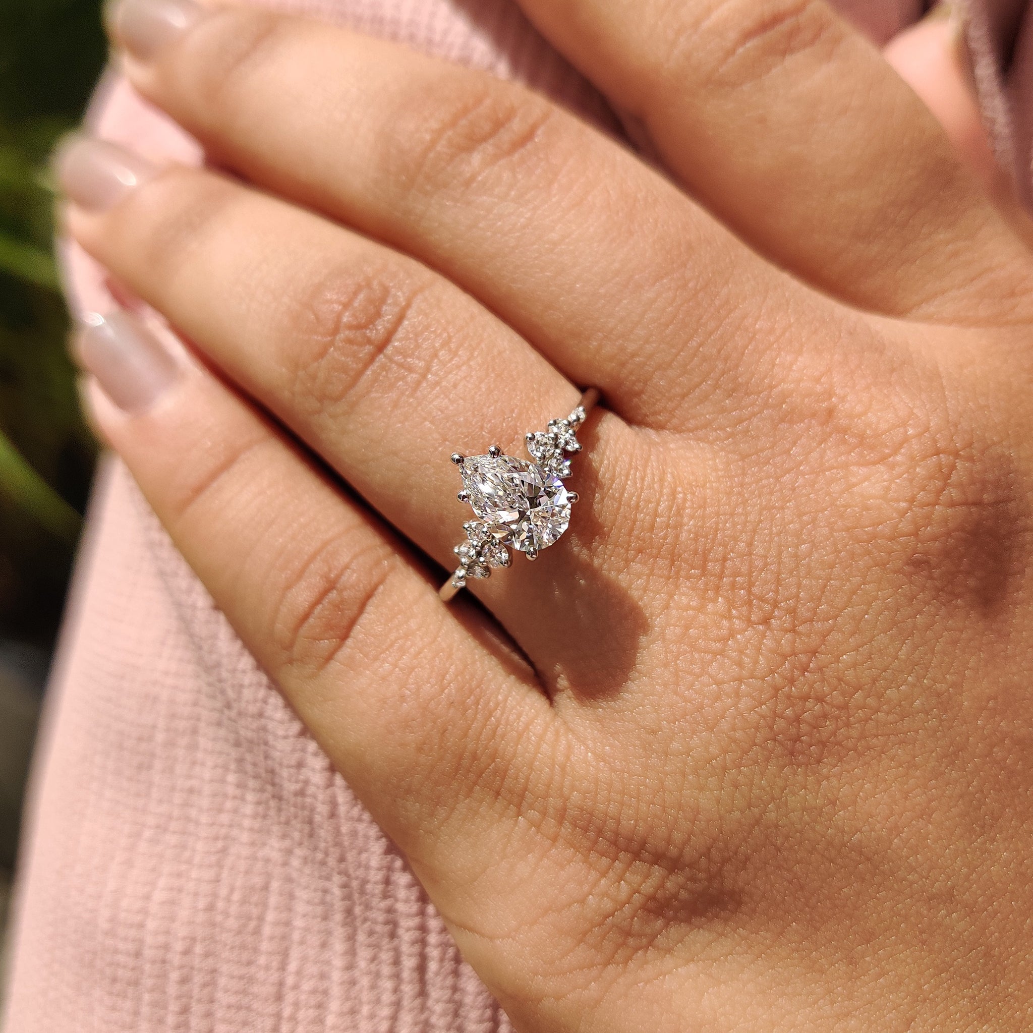 Pear Cluster Diamond Ring With Round Side Stone Secondary image