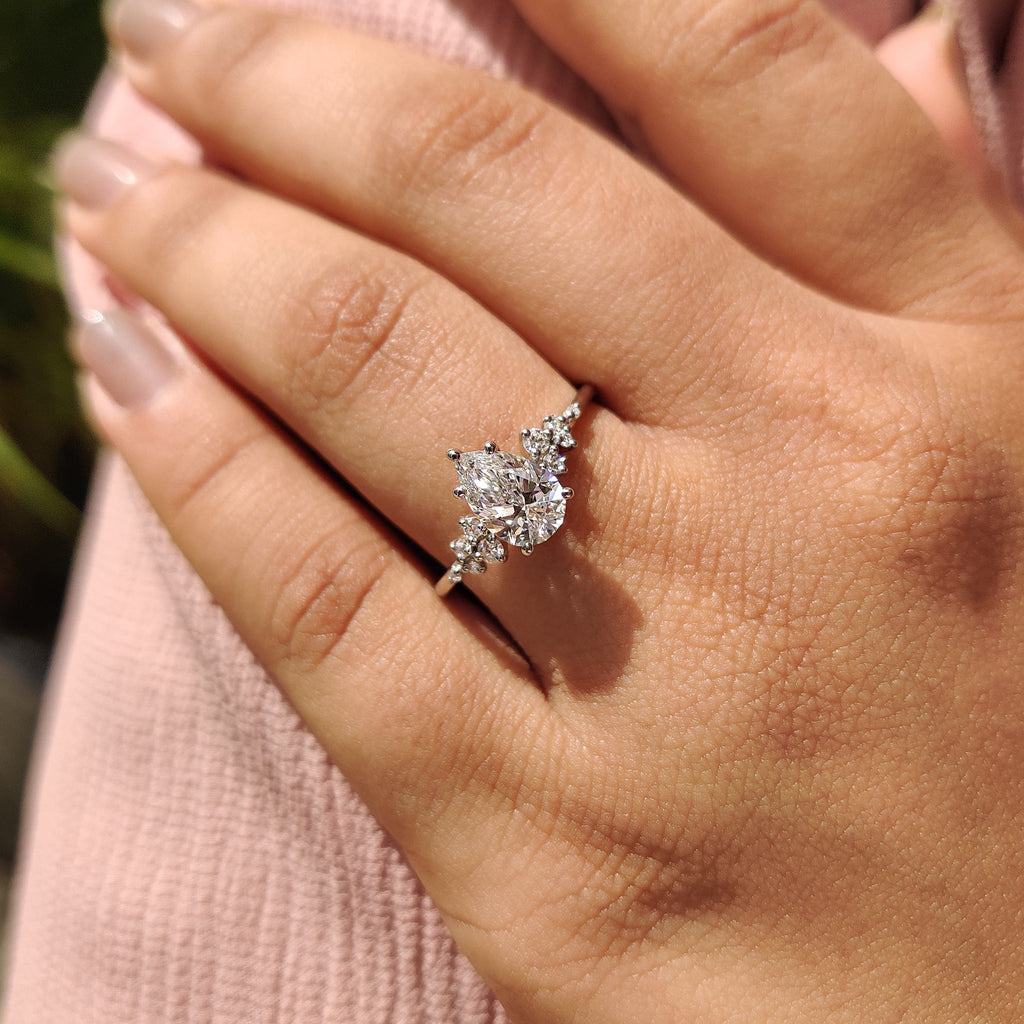 Pear Shaped Diamond Ring - Side Stone