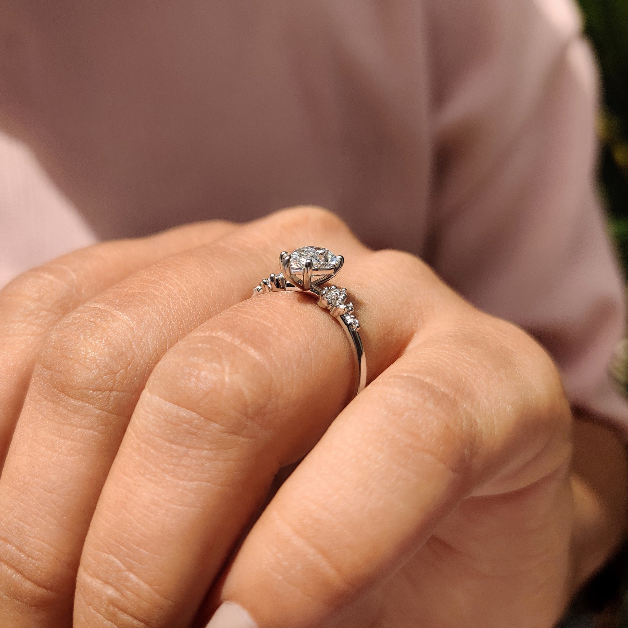 Pear Cluster Diamond Ring With Round Side Stone