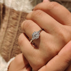 Oval Diamond Ring With Round Cut Side Stone