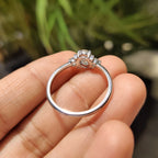 Oval Diamond Ring With Round Cut Side Stone