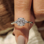 Oval Diamond Ring With Round Cut Side Stone