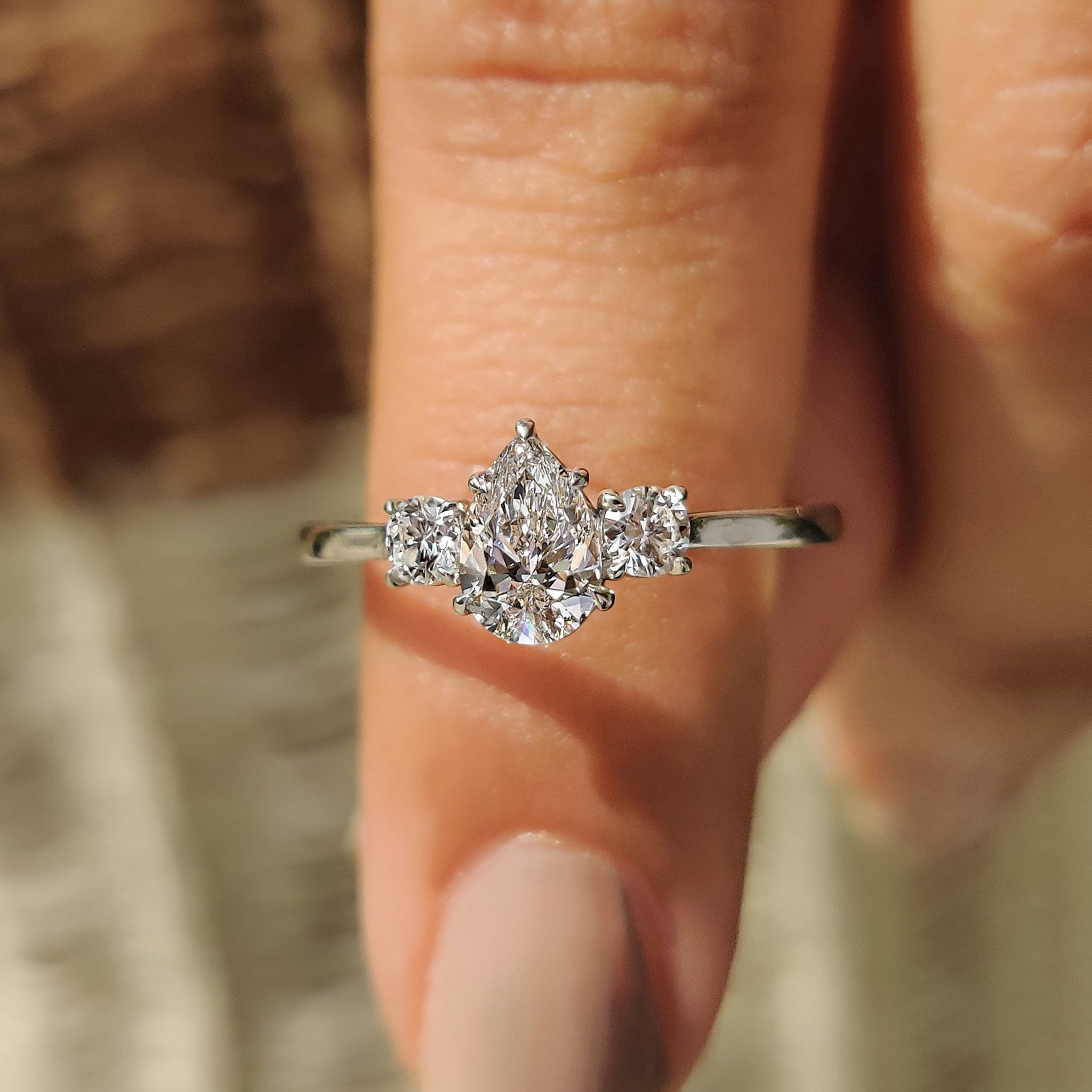 Pear Diamond Engagement Ring With Tapered Shank Setting