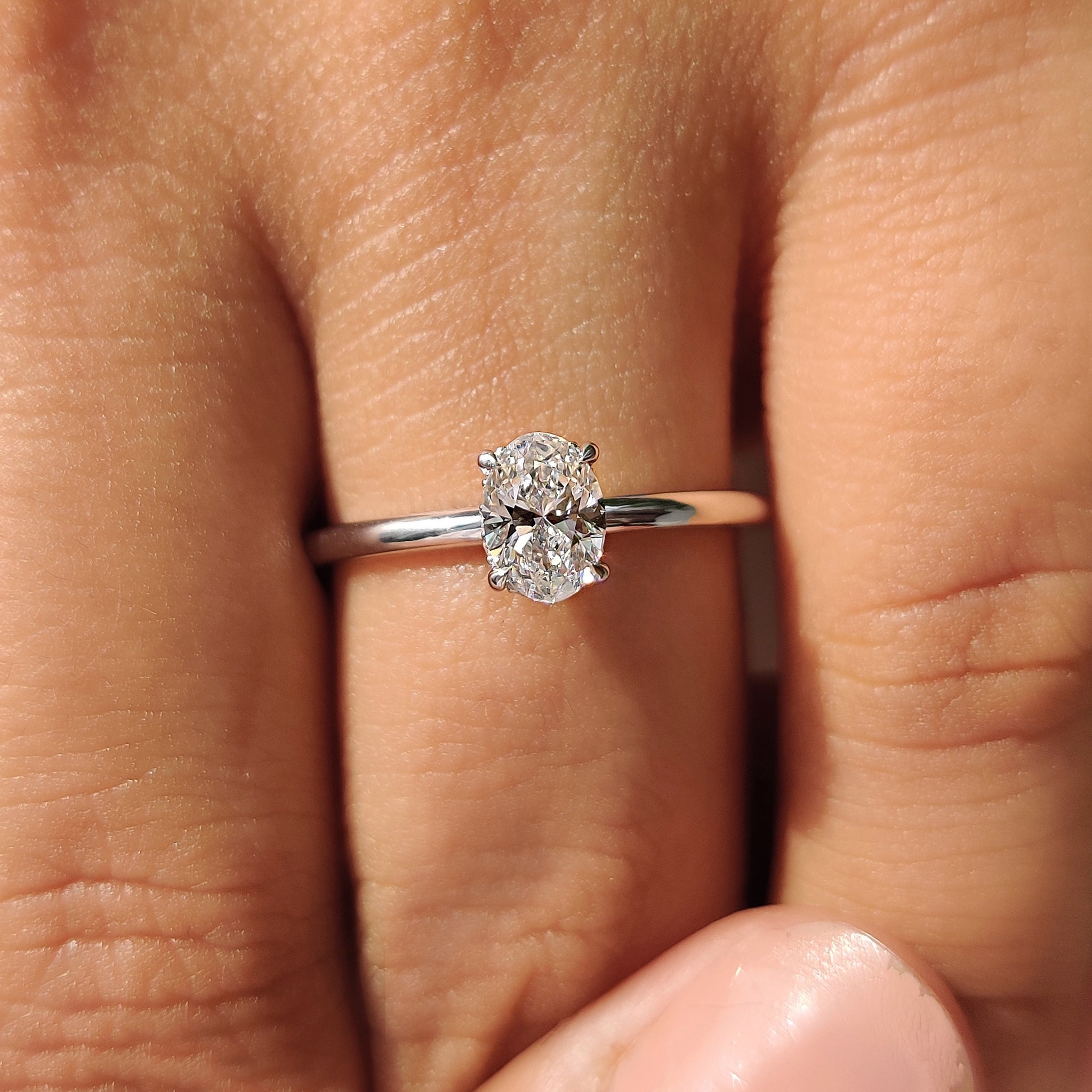 Oval Hidden Halo Engagement Ring
