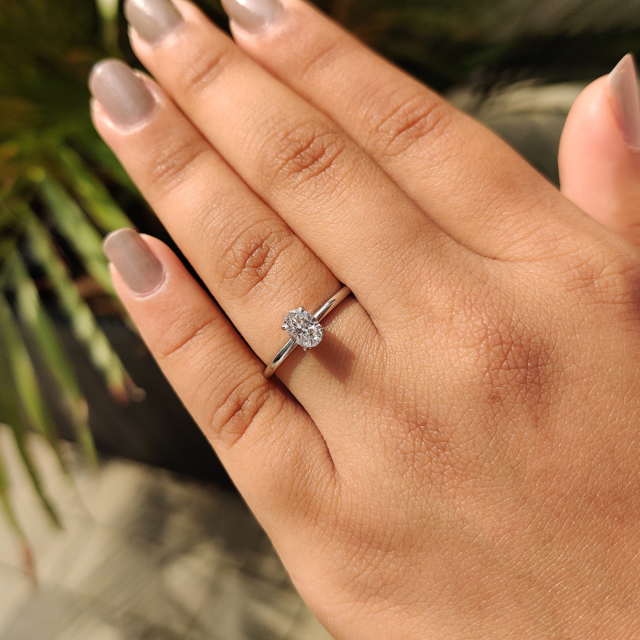 Oval Hidden Halo Engagement Ring