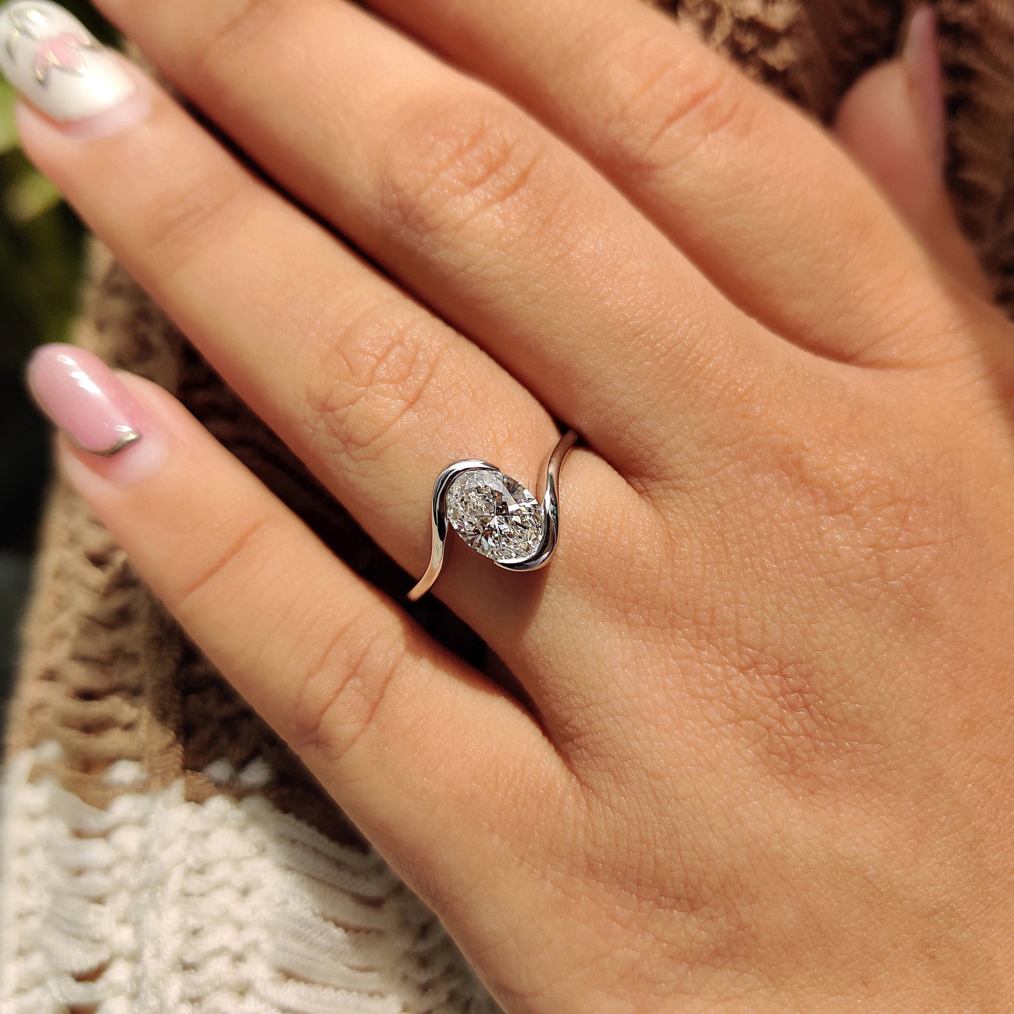 Oval Diamond Engagement Ring In Half Bezel Setting