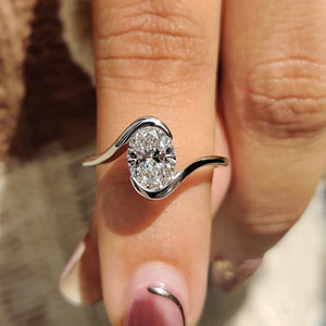 Oval Diamond Engagement Ring In Half Bezel Setting