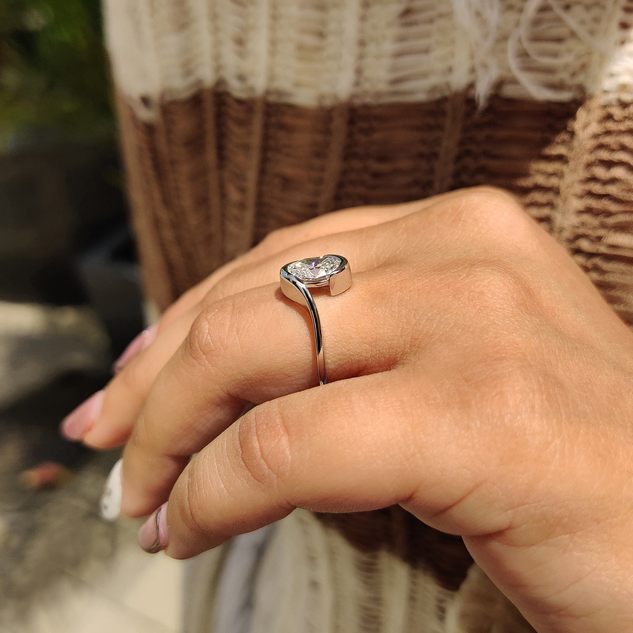 Oval Diamond Engagement Ring In Half Bezel Setting