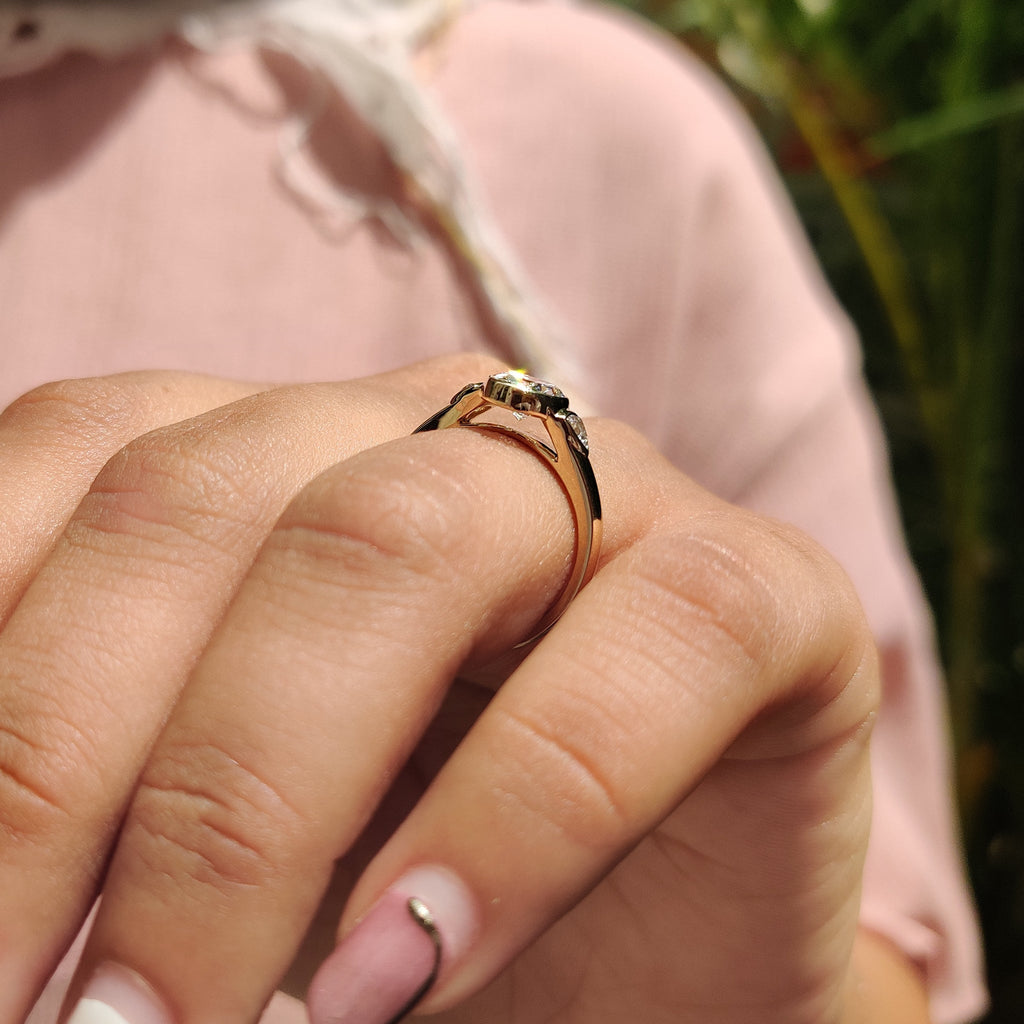 Oval Bezel Engagement Ring With Trillion Side Stone