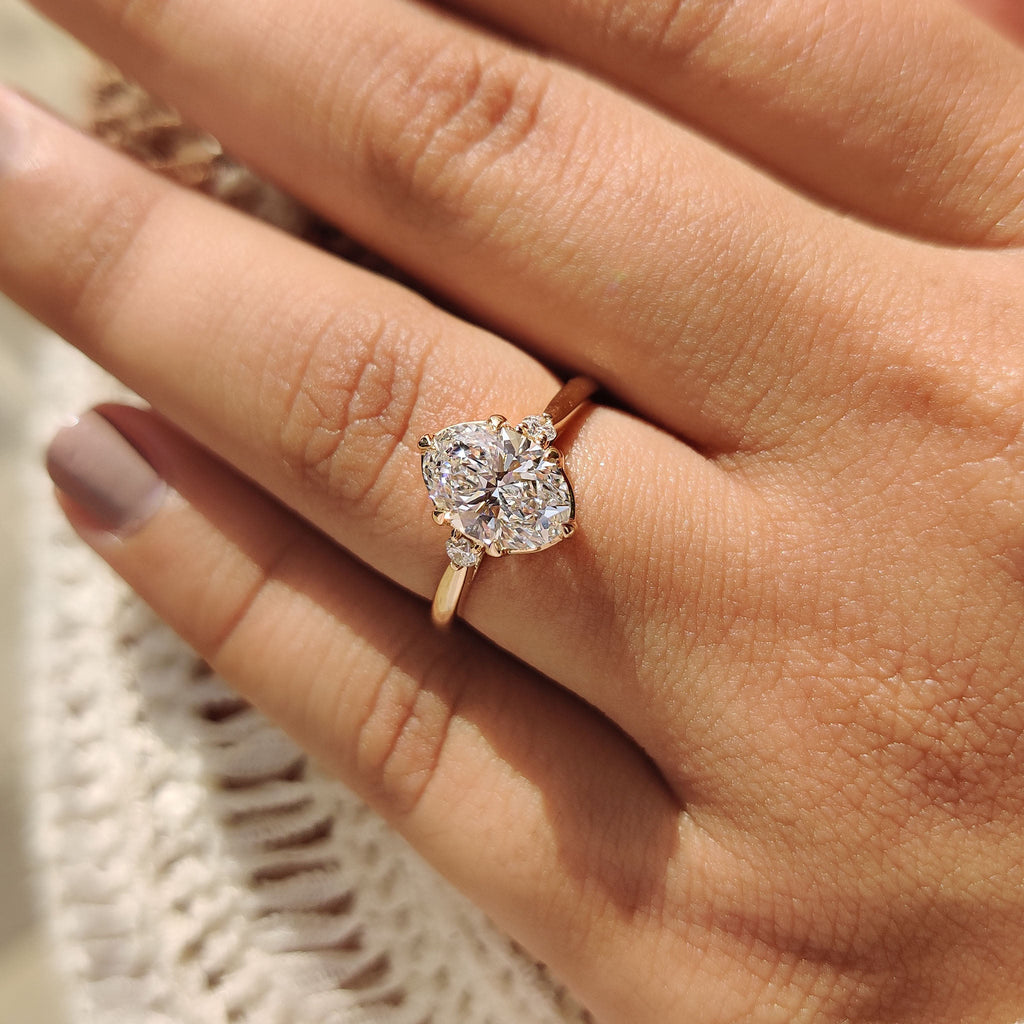 3 Stone Oval Engagement Ring With Tulip Basket Setting