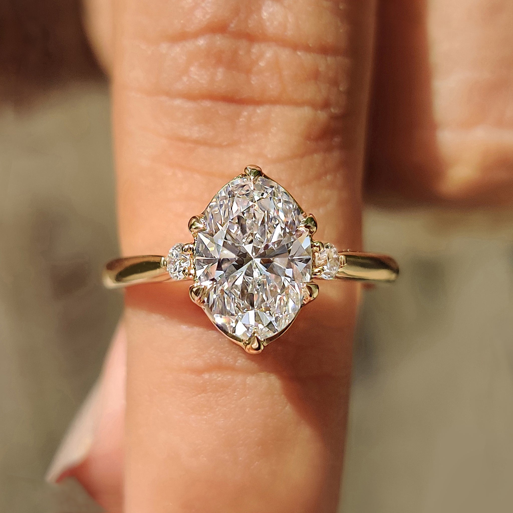 3 Stone Oval Engagement Ring With Tulip Basket Setting