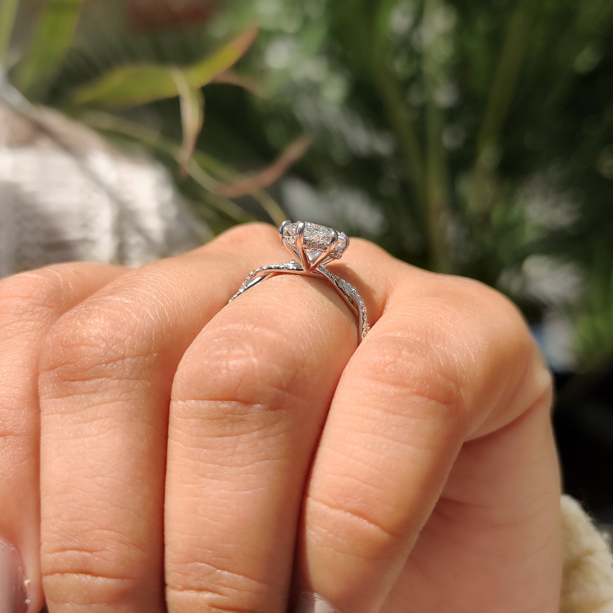 Marquise Cut Engagement Ring With Twisted Pave Band
