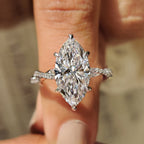 Marquise Cut Engagement Ring With Twisted Pave Band