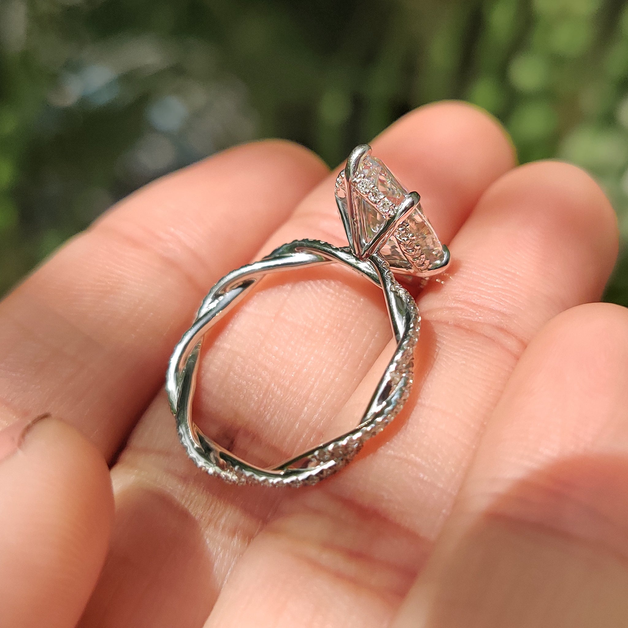 Marquise Cut Engagement Ring With Twisted Pave Band