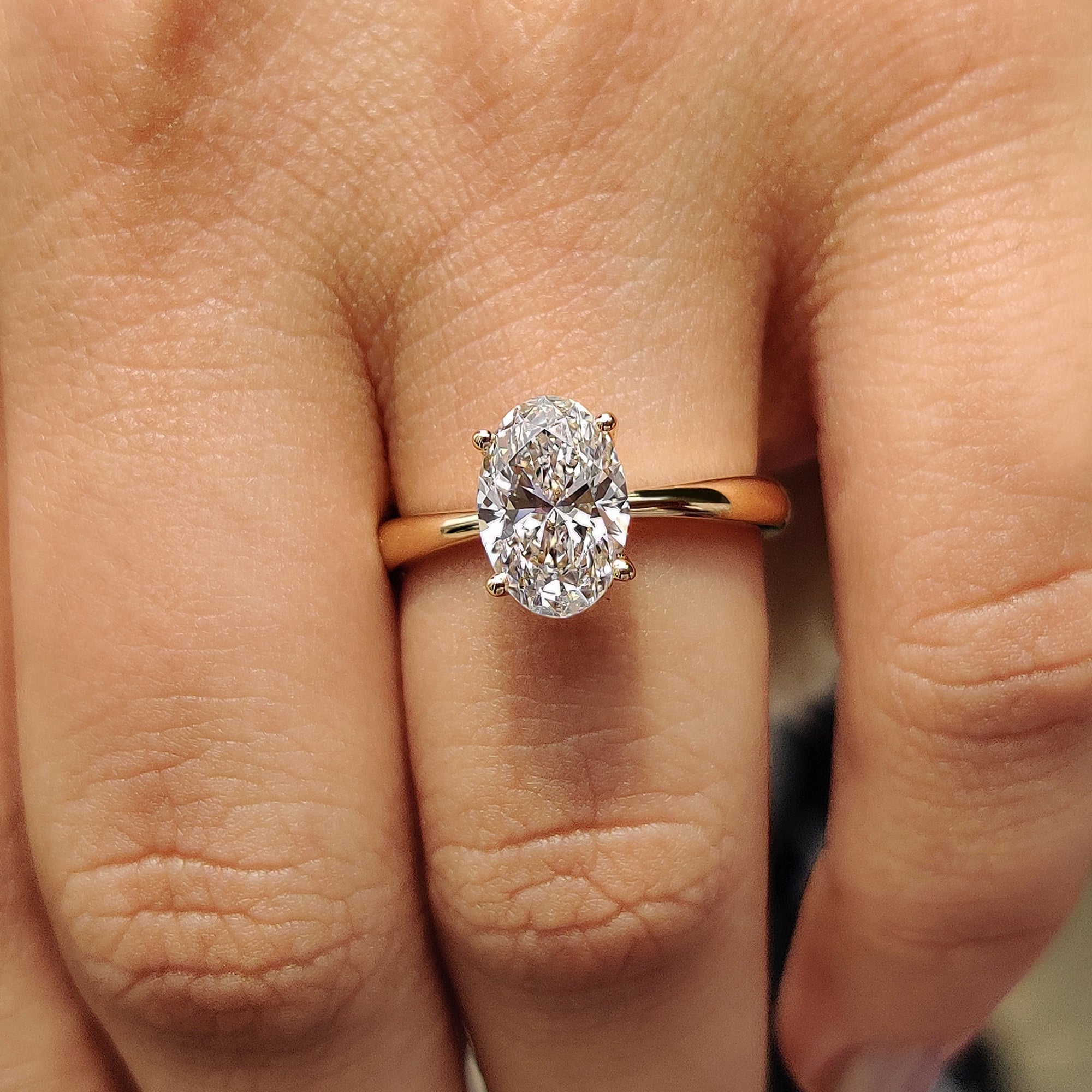 Oval Cut Engagement Ring In Hidden Halo Style