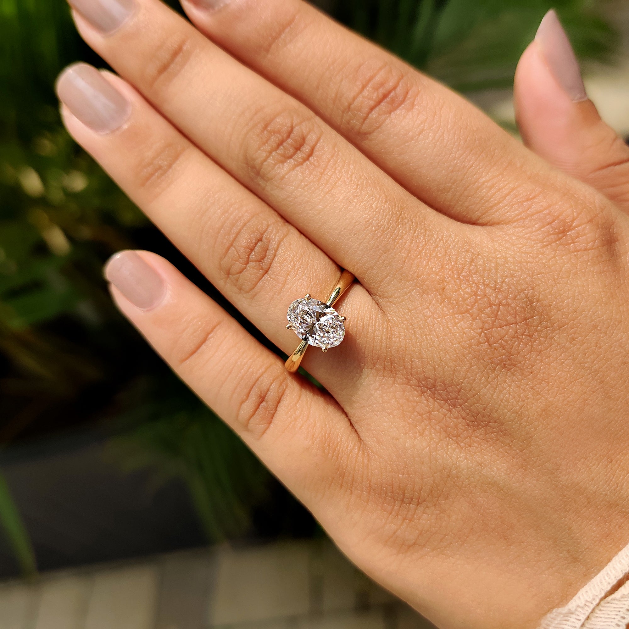 Oval Cut Engagement Ring In Hidden Halo Style Secondary image