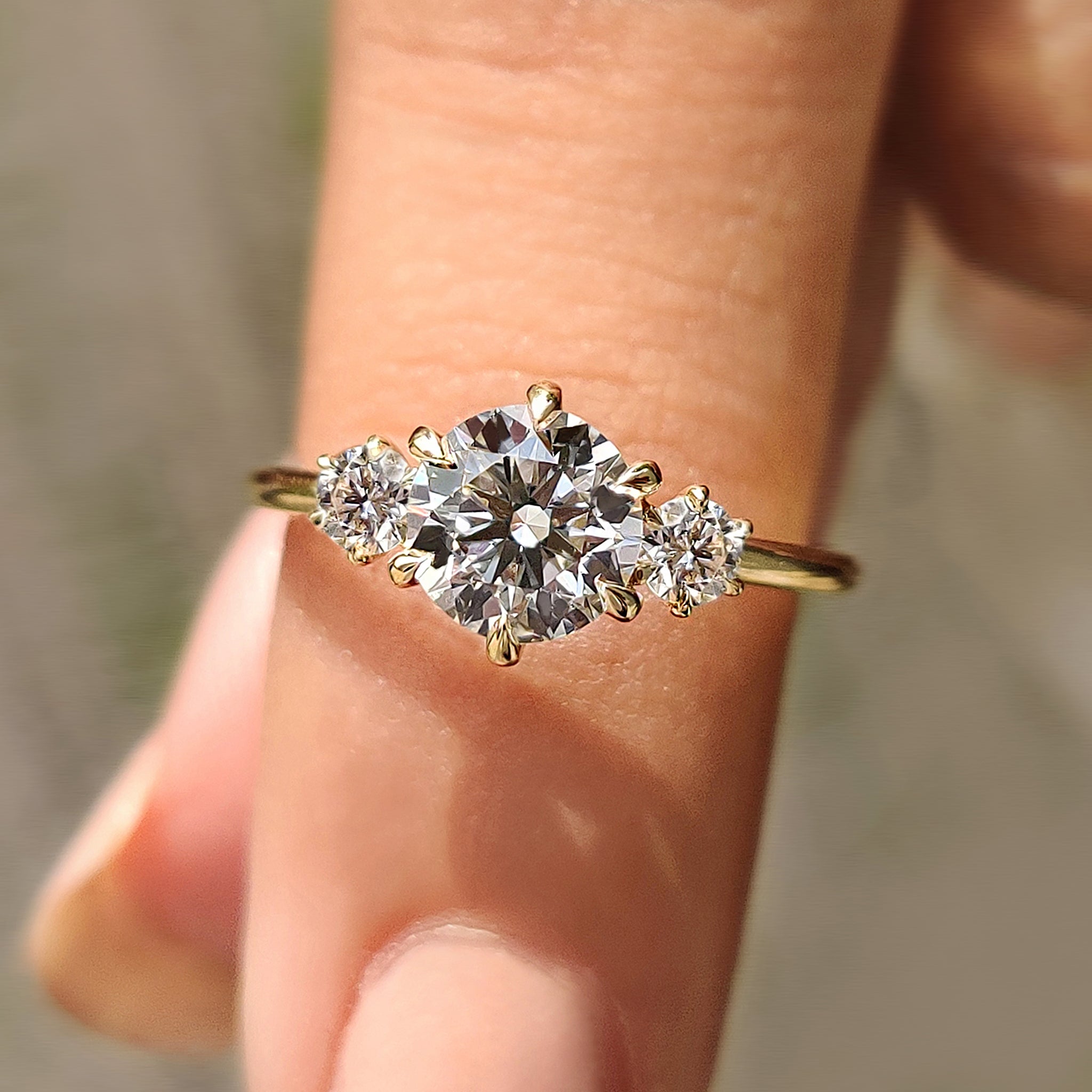 Round Cut Diamond Ring In 3 Stone Style
