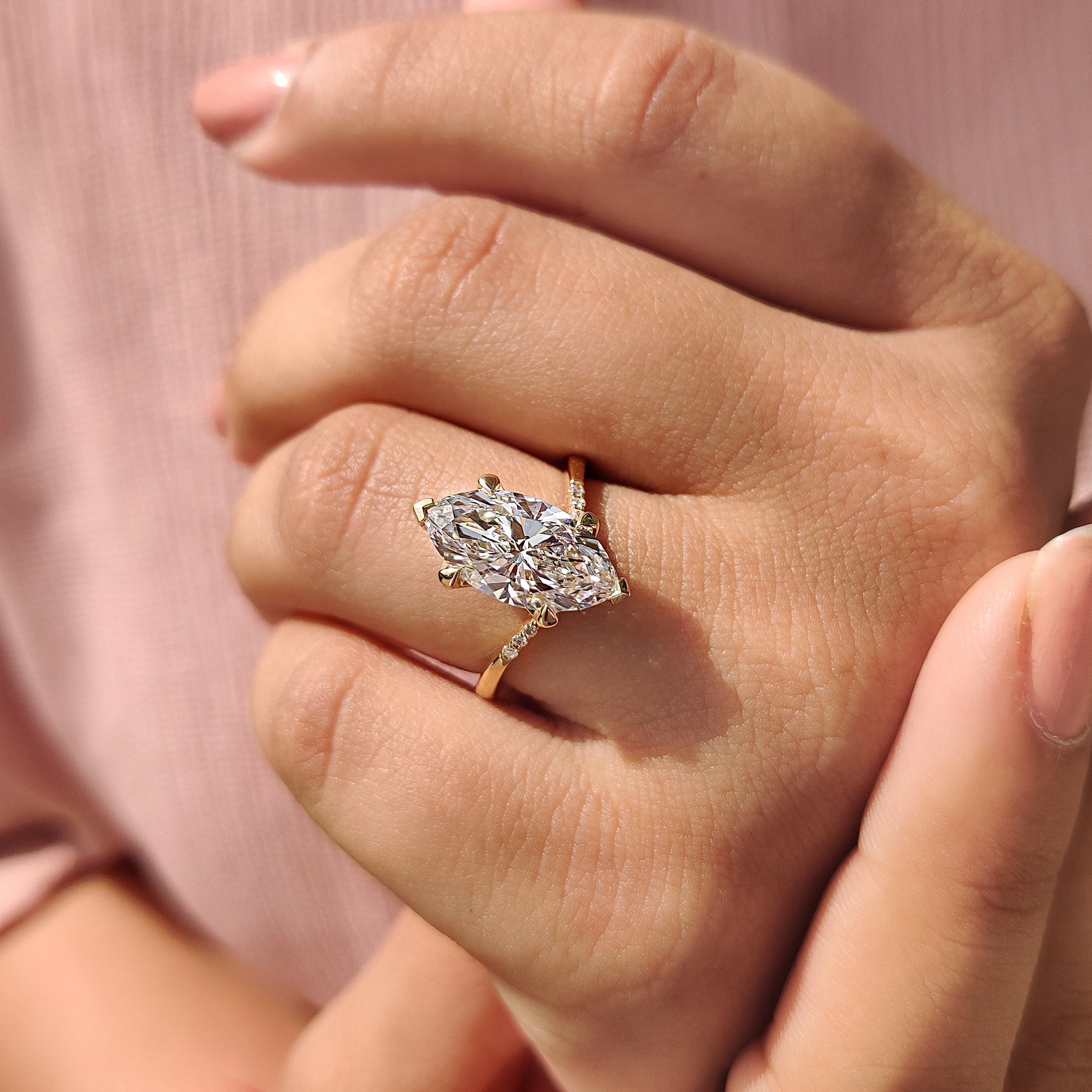 Gold Marquise Engagement Ring With Tapered Shank Band