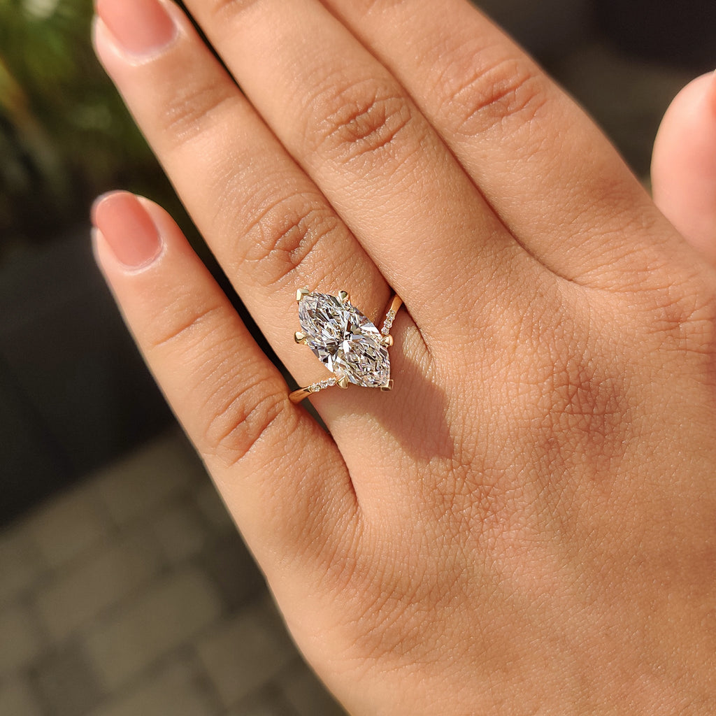 Gold Marquise Engagement Ring With Tapered Shank Band