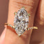 Gold Marquise Engagement Ring With Tapered Shank Band