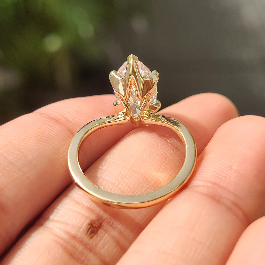 Gold Marquise Engagement Ring With Tapered Shank Band