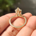 Gold Marquise Engagement Ring With Tapered Shank Band