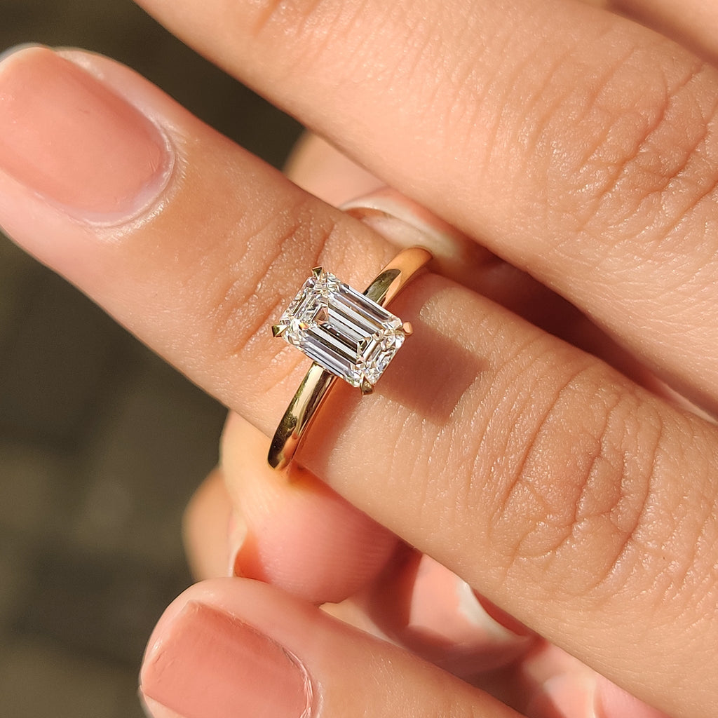 Emerald Cut Solitaire Ring In Basket Design