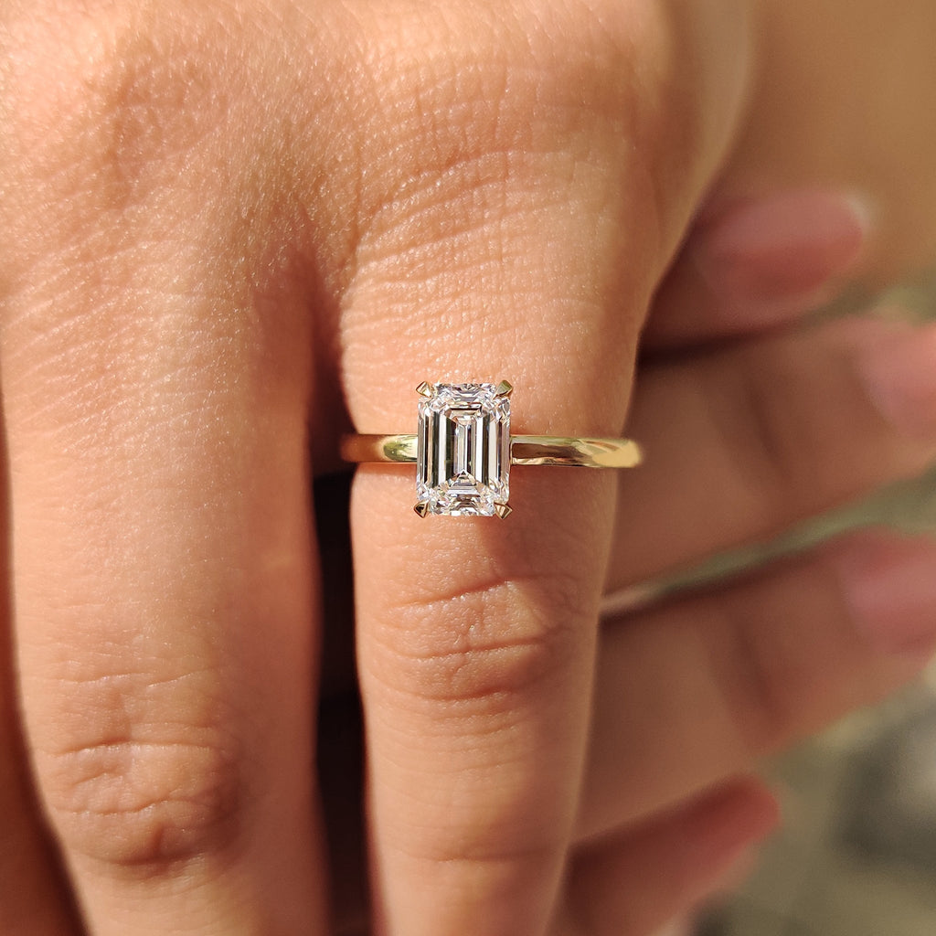 Emerald Cut Solitaire Ring In Basket Design