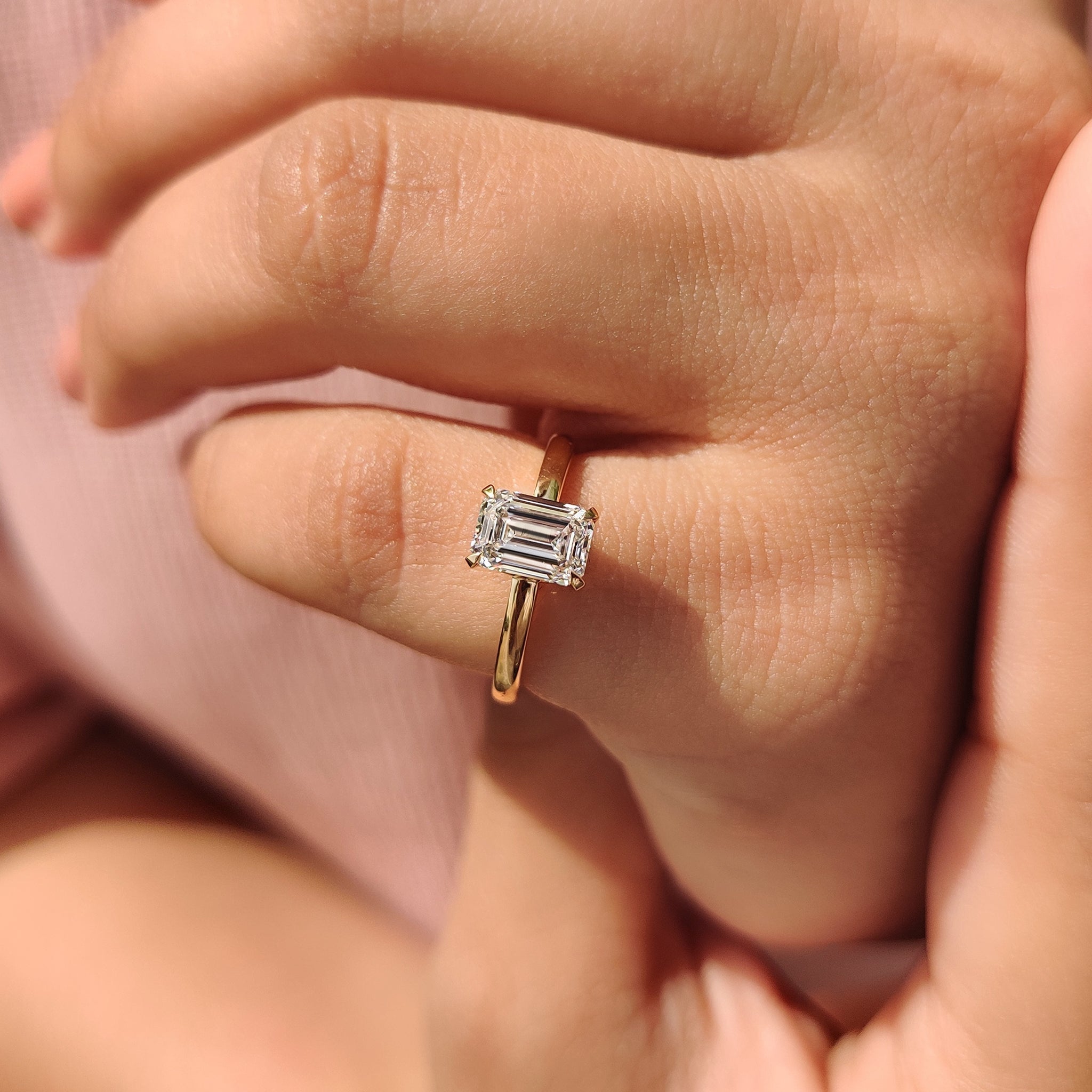 Emerald Cut Solitaire Ring In Basket Design