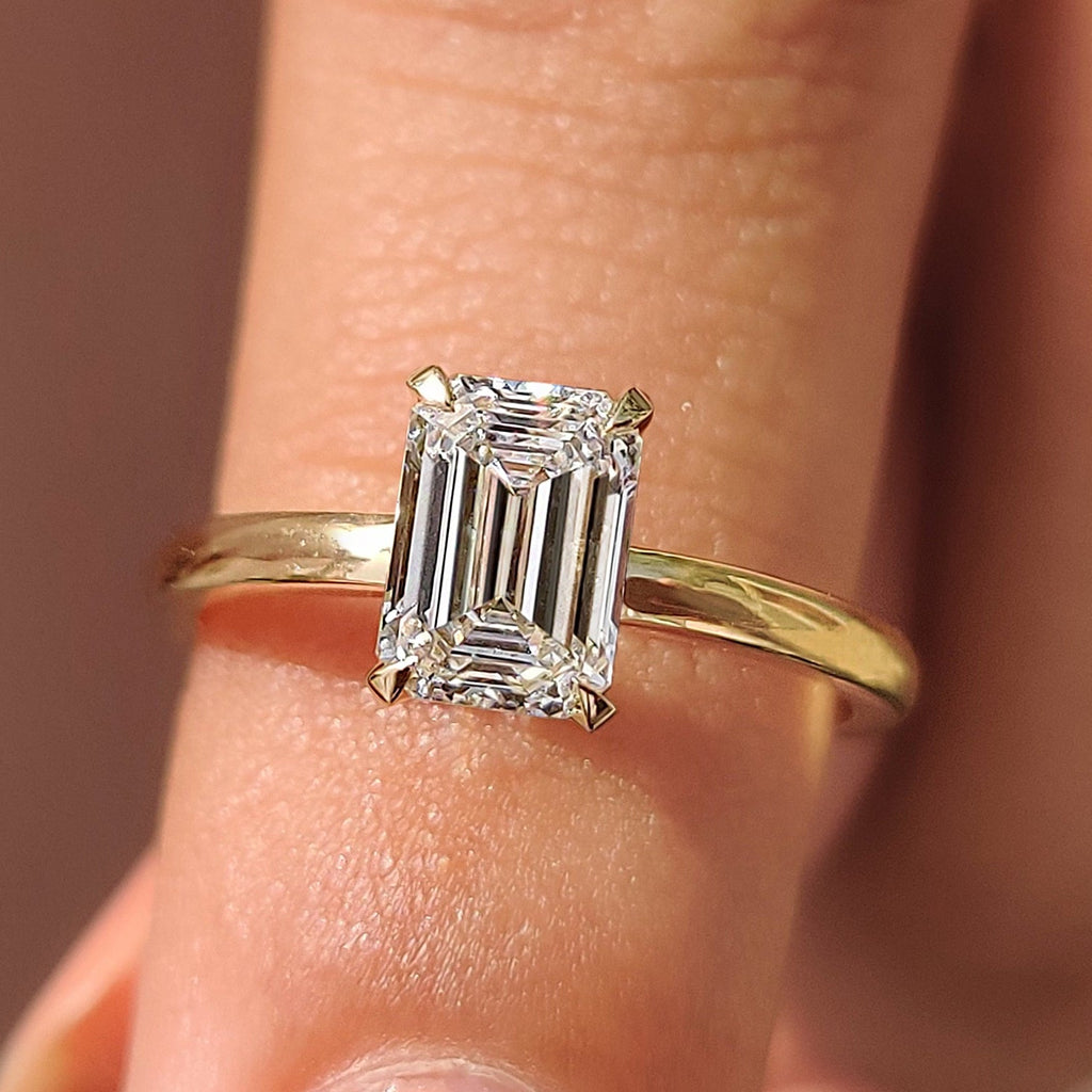 Emerald Cut Solitaire Ring In Basket Design
