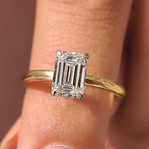 Emerald Cut Solitaire Ring In Basket Design