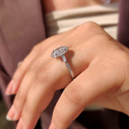 Oval Cut Engagement Ring With Tapered Baguette Side Stone
