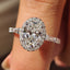 Oval Cut Engagement Ring With Tapered Baguette Side Stone