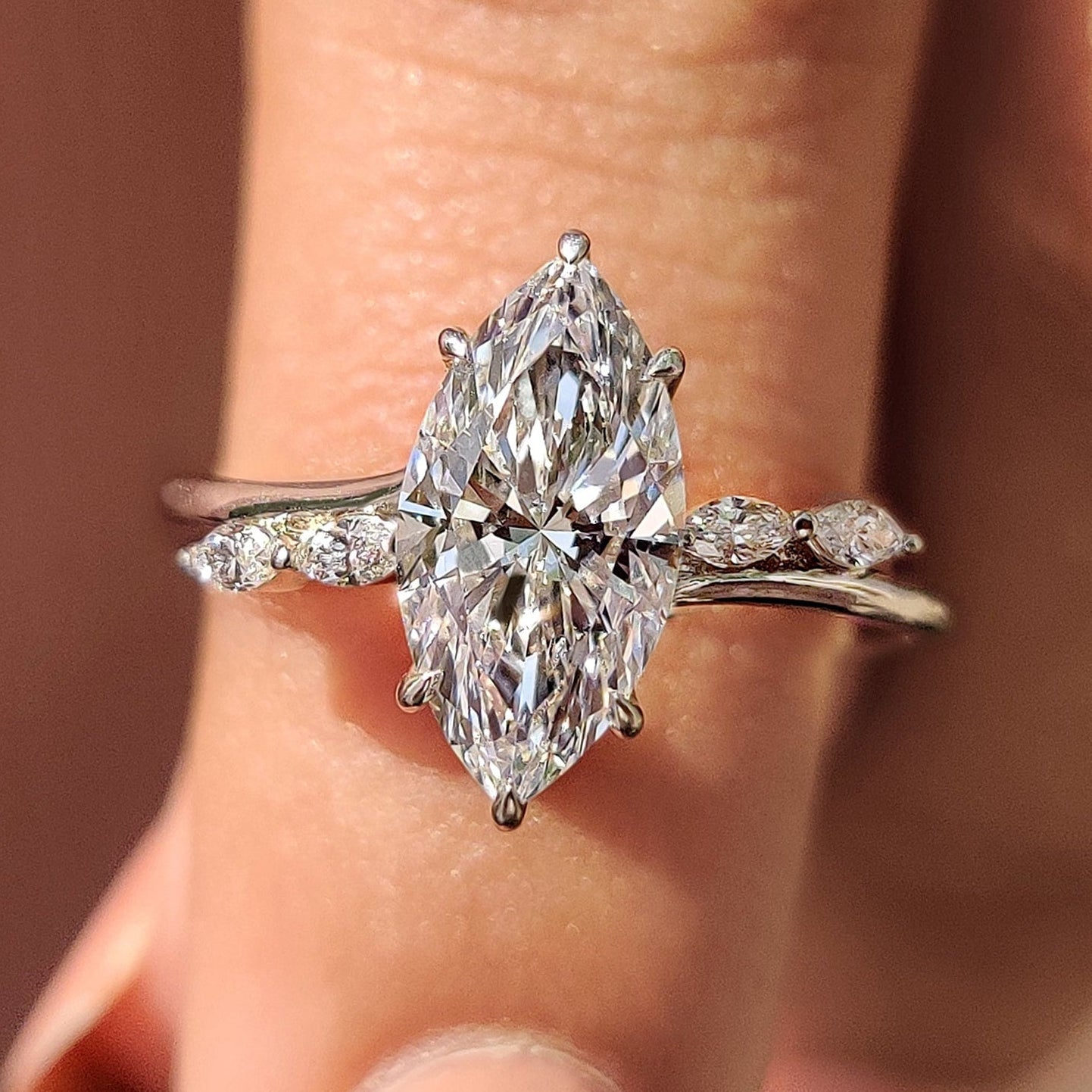 Marquise Cut Diamond Engagement Ring In Hidden Halo Style