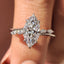 Marquise Cut Diamond Engagement Ring In Hidden Halo Style