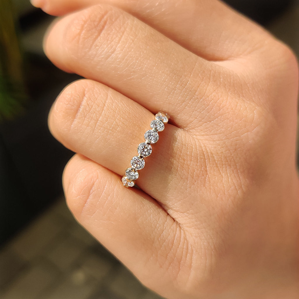 Round Cut Diamond Shared Prong Wedding Band