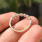 Round Cut Diamond Shared Prong Wedding Band