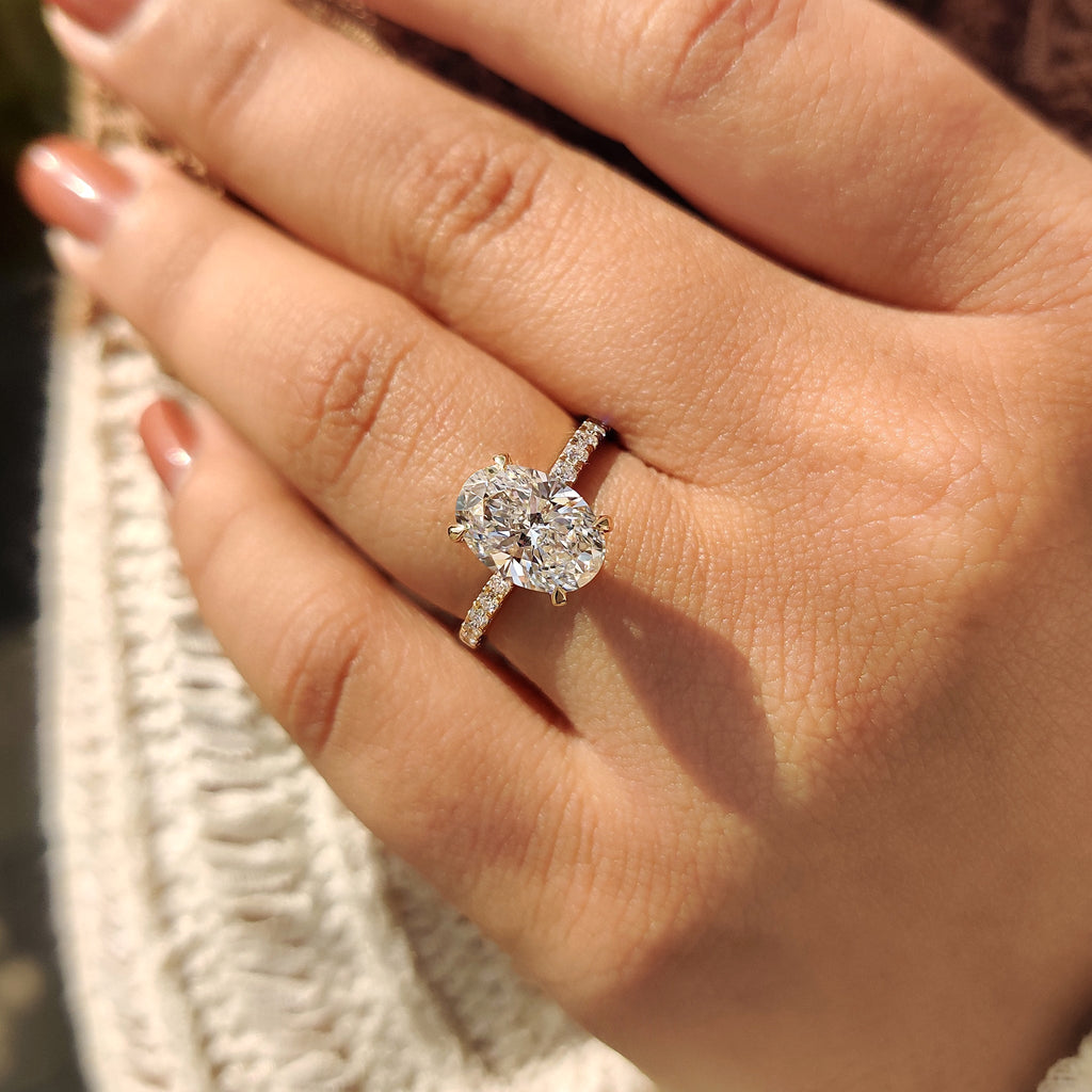 Yellow Gold Oval Diamond Ring in Pave Setting