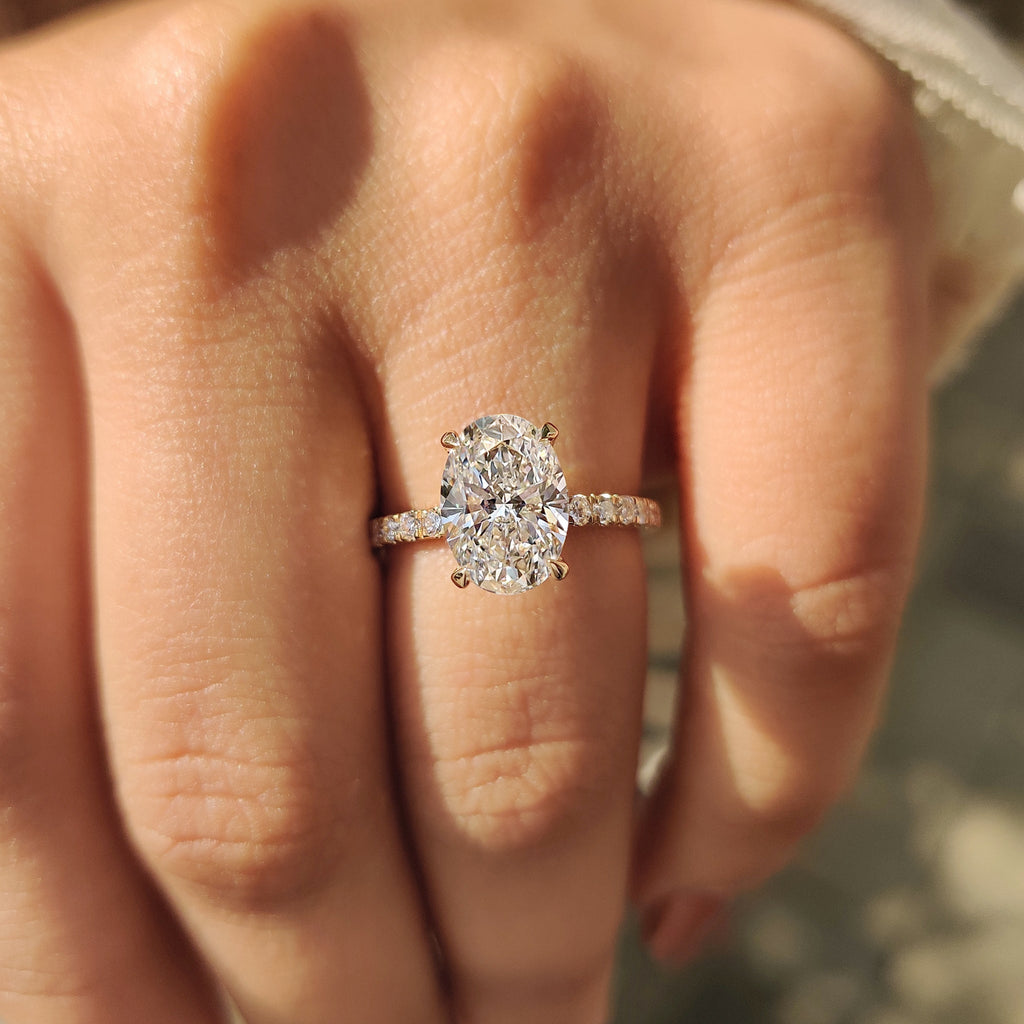 Yellow Gold Oval Diamond Ring in Pave Setting