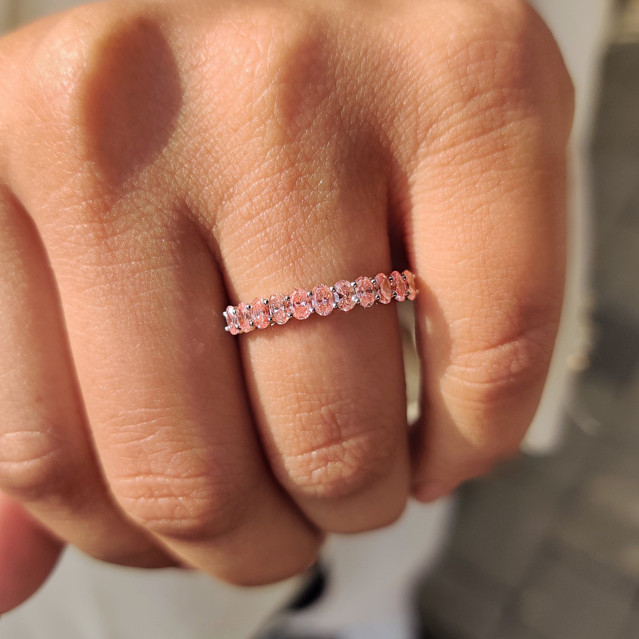 Oval Cut Pink Diamond Wedding Band In Half Eternity Style
