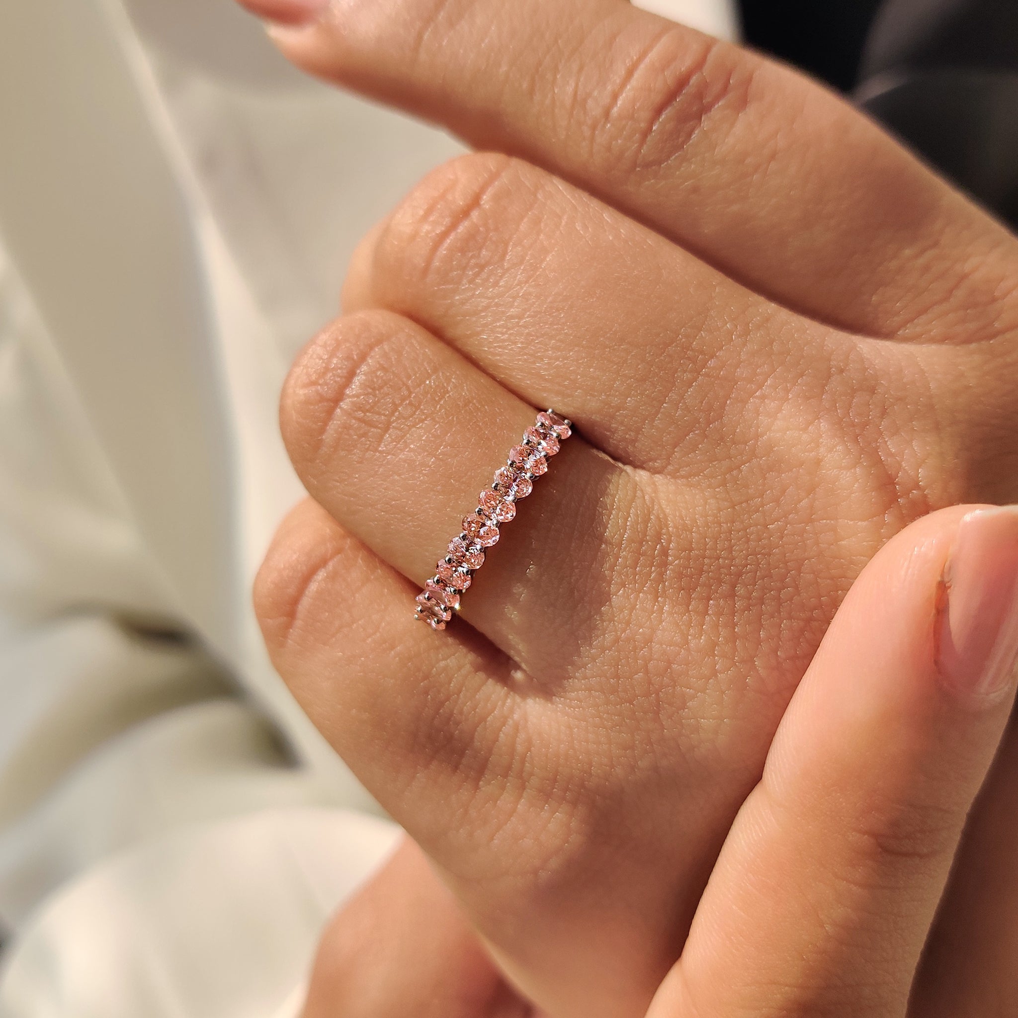 Oval Cut Pink Diamond Wedding Band In Half Eternity Style