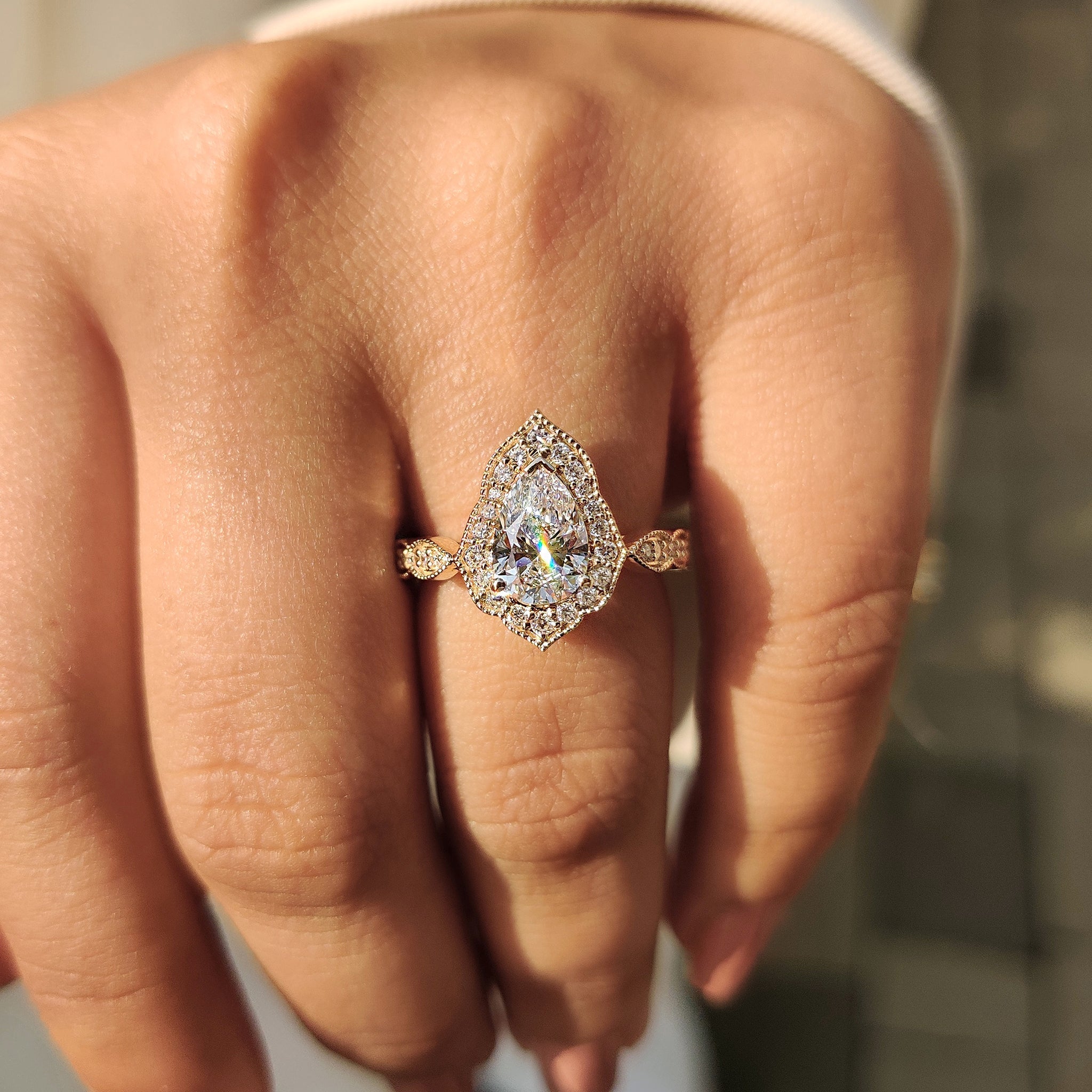 Pear Cut Vintage Diamond Engagement Ring in Halo Setting