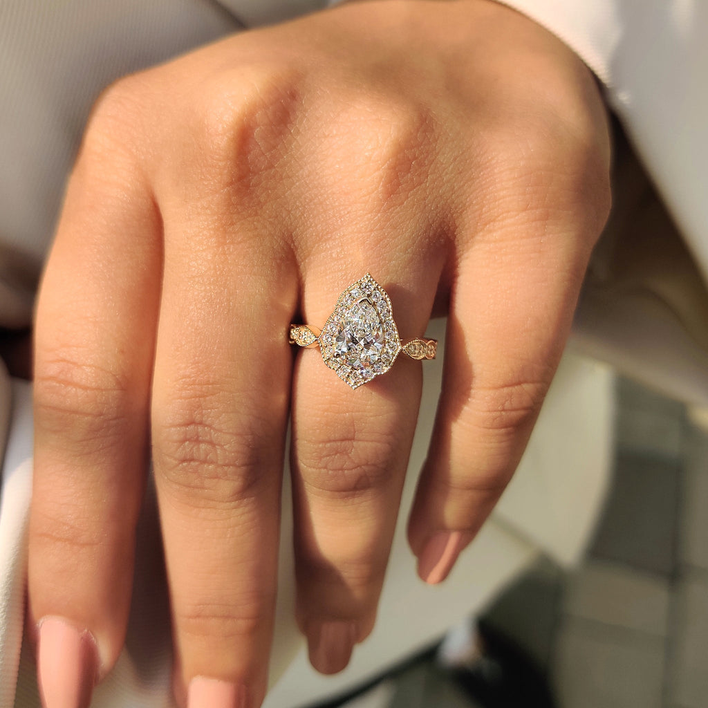 Pear Cut Vintage Diamond Engagement Ring in Halo Setting