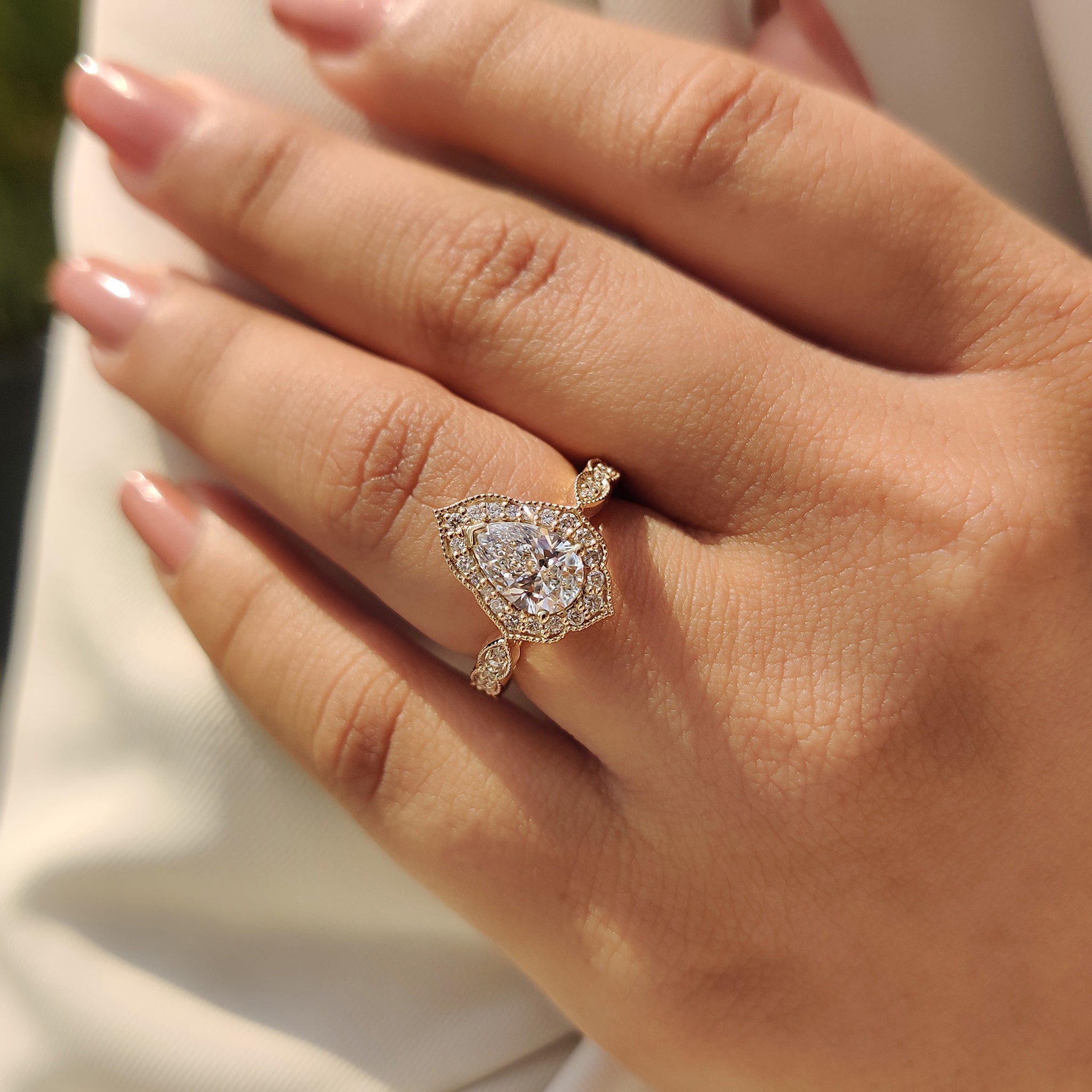 Pear Cut Vintage Diamond Engagement Ring in Halo Setting