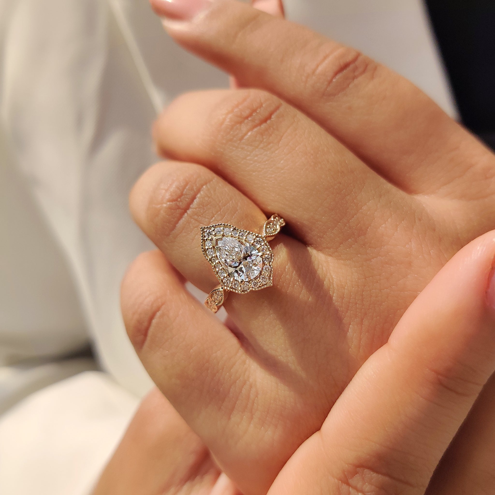 Pear Cut Vintage Diamond Engagement Ring in Halo Setting